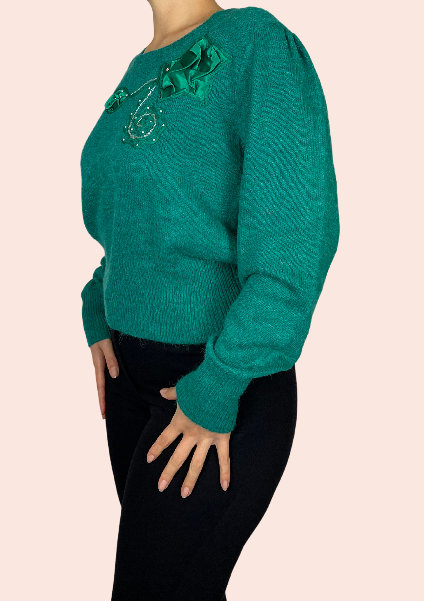 Green jumper with embellishments