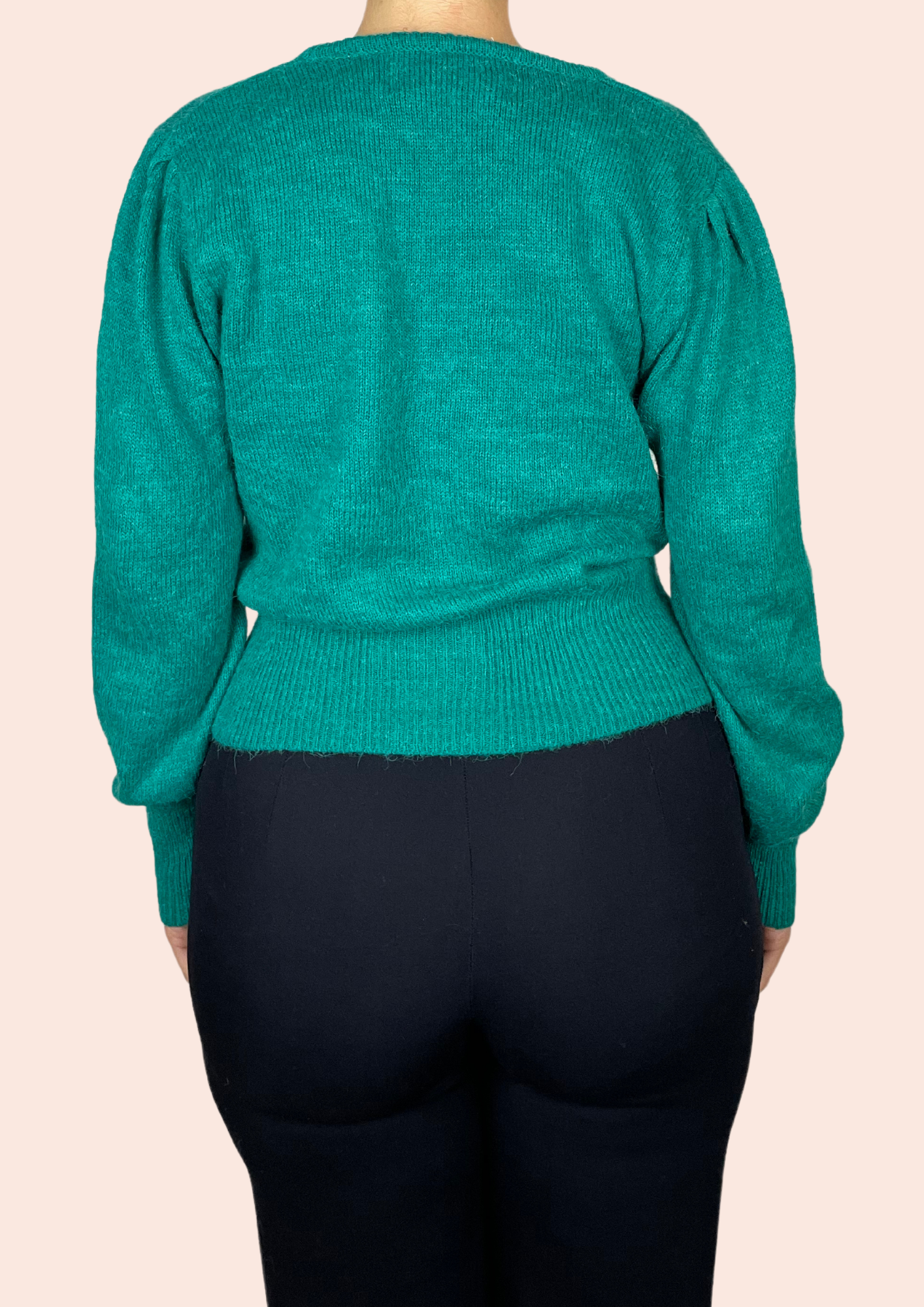 Green jumper with embellishments