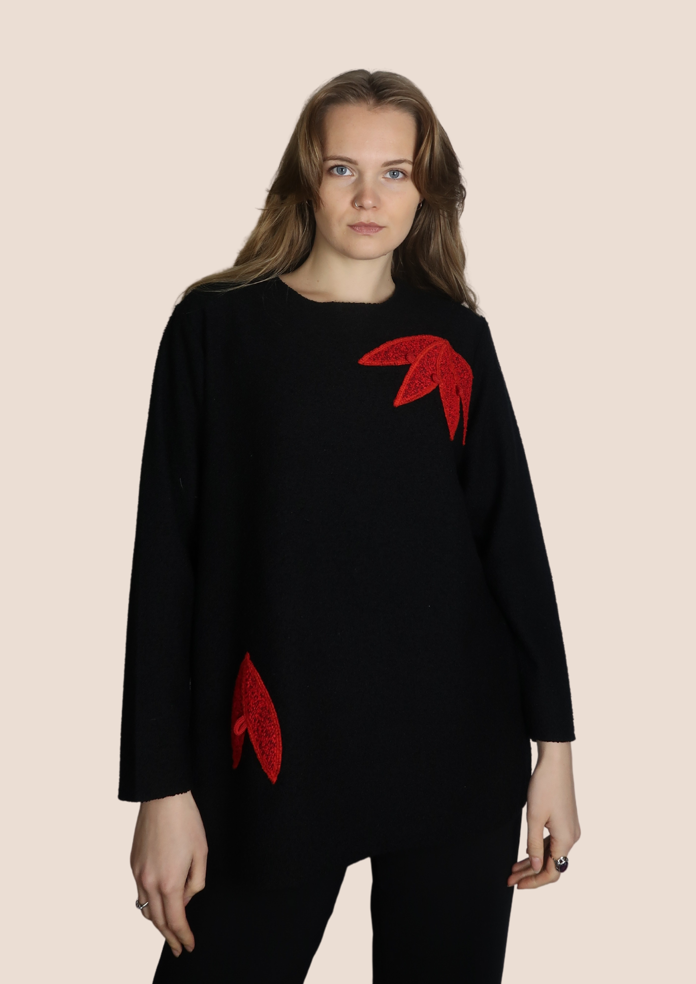 Black jumper with red flowers