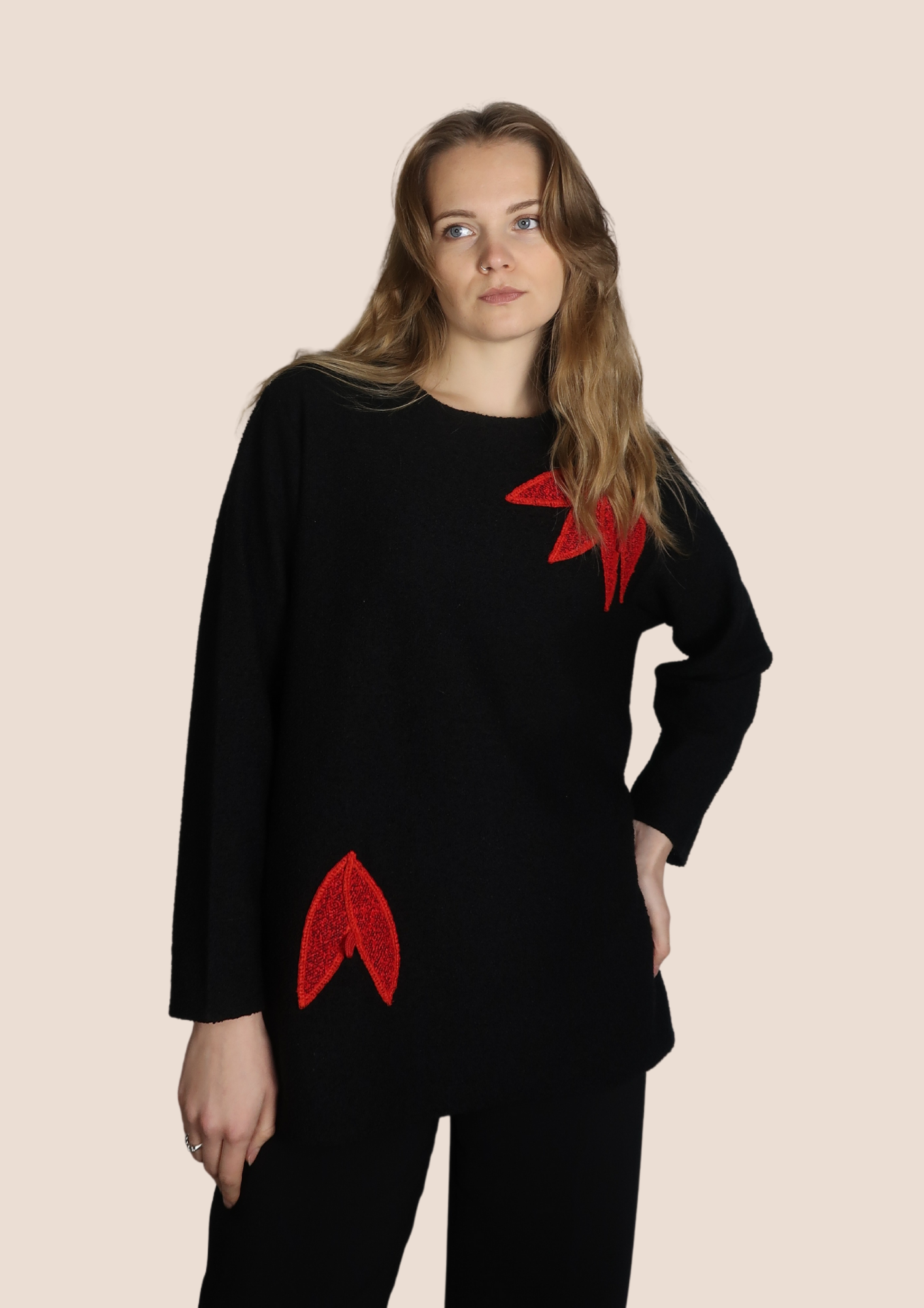 Black jumper with red flowers